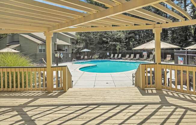 take a dip in the pool under the pergola at Hunters Chase Apartments, Midlothian, VA, 23112