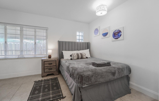 225 NW 14 AVE