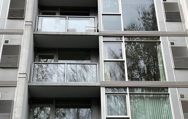 Modern Studio with Balcony, In-Unit Laundry, and Prime Lloyd District Location!
