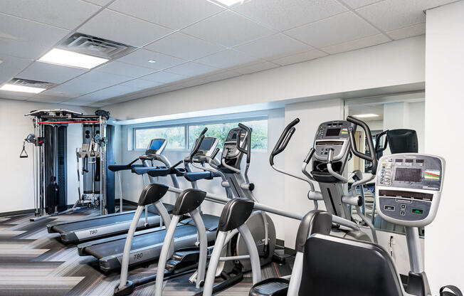 Fitness center with cardio and cable machine