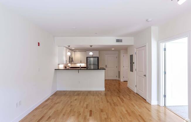 Open kitchen area into a large living room at 7 Cameron Apartments, Cambridge
