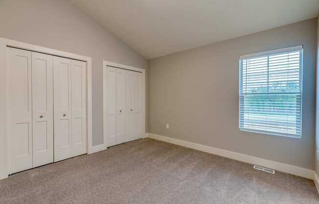 Bedroom at the Quarry Apartments in DeWitt Michigan