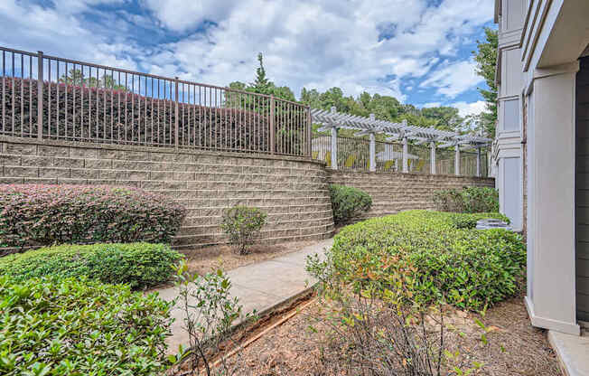 A house with a garden and a fence.