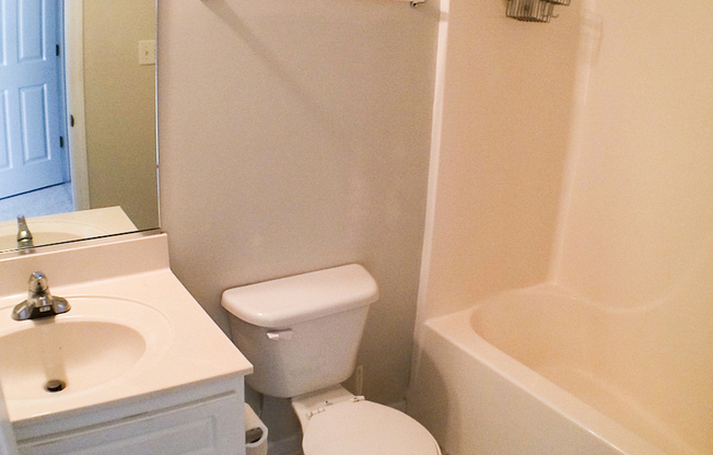 Modern 2 bedroom 2.5 bath Townhome with fenced backyard and Washer/Dryer included!