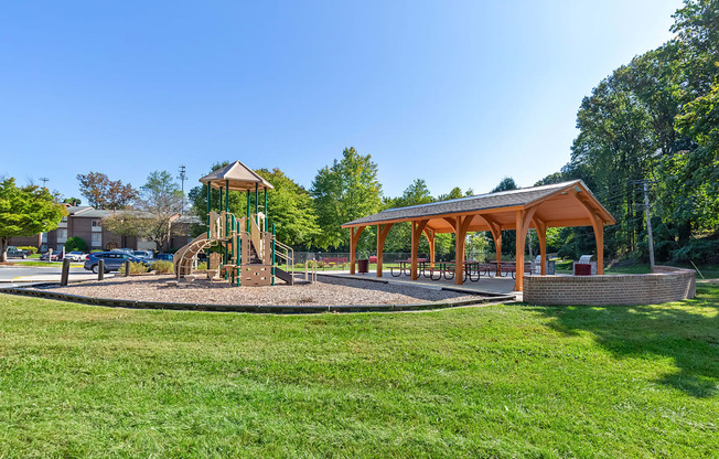 a park with a playground and a pavilion at Copper and Quarry Village, Pikesville, 21209