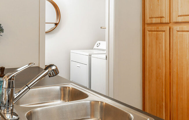 Stainless Steel Sink With Faucet In Kitchen at Four Seasons at Southtowne Apartments, South Jordan, UT, 84095