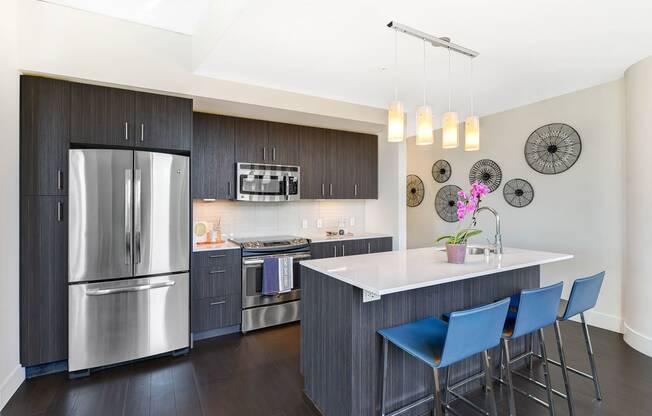 French-Door Refrigerator, Kitchen Islands And Quartz Countertops In Chef-Inspired Kitchens at Cirrus, 2030 8th Avenue, Seattle