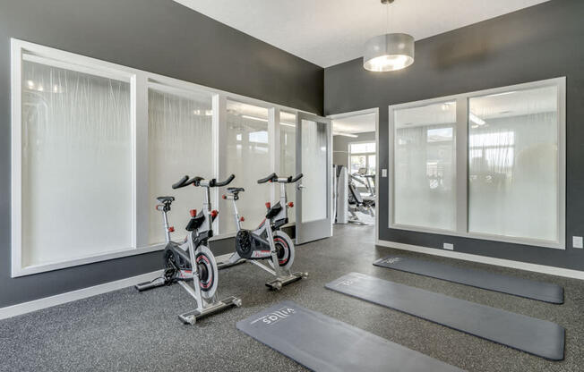 Yoga/spin studio at The Villas at Falling Waters luxury townhomes for rent in west Omaha NE