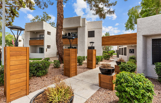 a courtyard with trees and plants