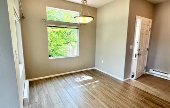 Charming corner 2 bedroom 2 bath with attached Garage!
