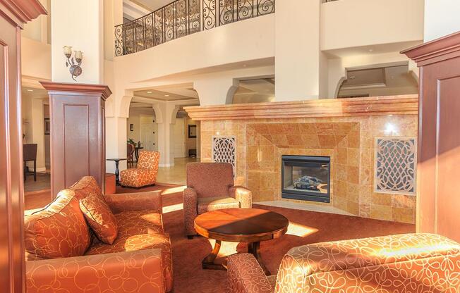 a living room filled with furniture and a fire place