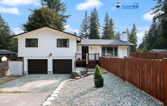 Home with private Long Lake community beach access with 3 beds 2 baths. North Thurston School District.