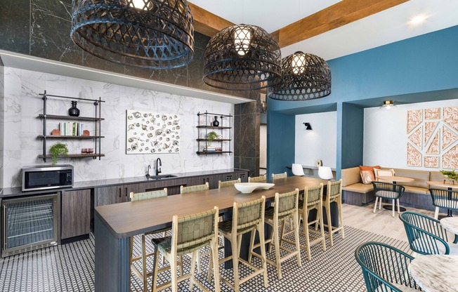 Discover the heart of community living at Modera Georgetown's expansive clubroom, complete with a cozy coffee bar.