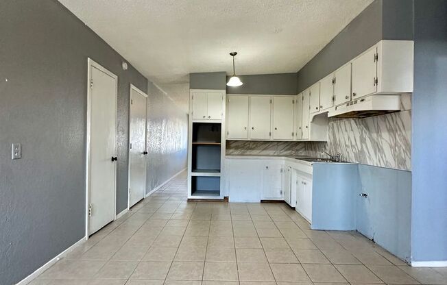 Spacious 4-Bedroom Home w/ Two Living Rooms!!