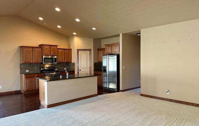 $500 OFF MOVE-IN SPECIAL! Beautiful 3 Bed 2 Bath Five Mile Rancher w/ Huge Attached 3rd Garage + Mezzanine and Fully-Fenced Yard!