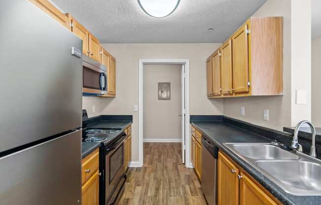 the preserve at ballantyne commons apartment kitchen with stainless steel appliances
