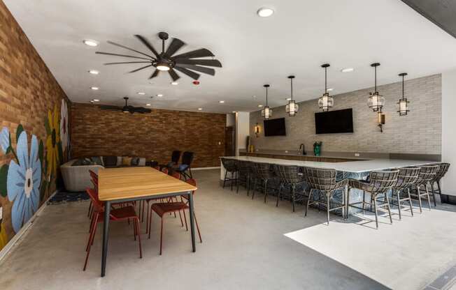 resident center with screens on the wall at St. Elmo Apartment in Austin, TX