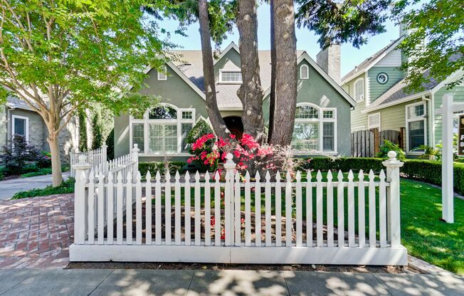 Stunning two-story spacious home on tranquil tree-lined street.