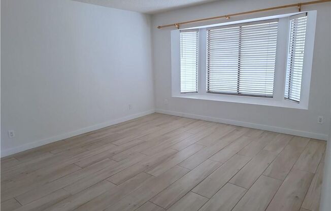 The Lakes Home with No Carpet, Fireplace & Covered Patio