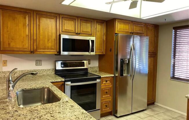 Annual unfurnished renovated 2/2 2nd floor condo with golf course view in Palm Aire
