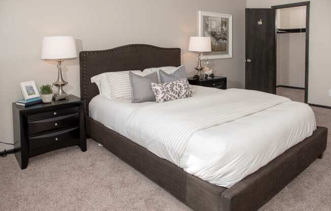 one plus den model,  spacious bedroom with large closet