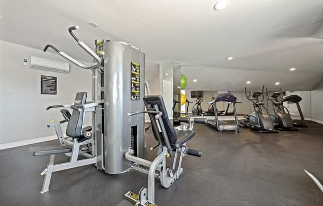 the gym at District at Fiesta Park apartments