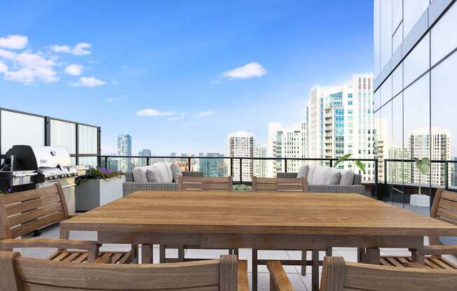 a communal table on a balcony with a view of the city at Cassidy on Canal, Illinois