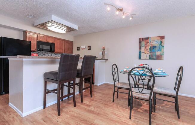 a kitchen with a dining room table