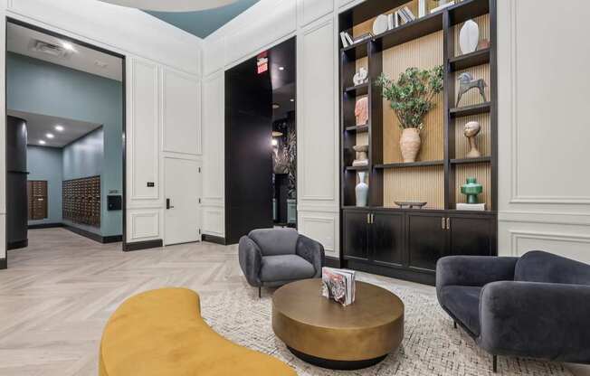 A living room with a wooden coffee table and grey couches.