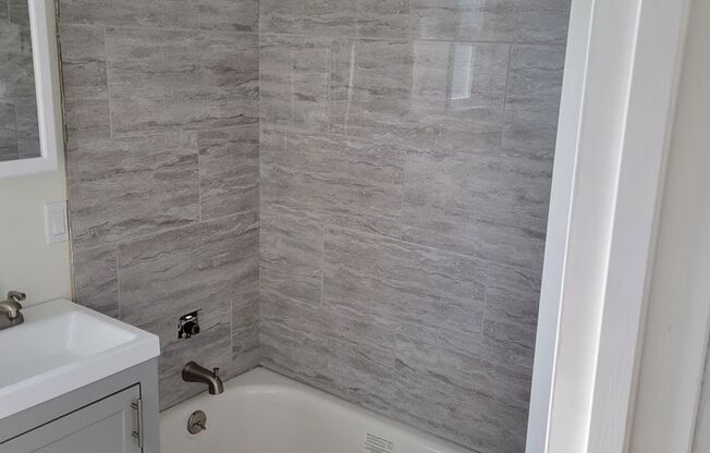 UPDATE ONE BED  ONE BATH SINGLE STANDING UNIT WITH PARKING