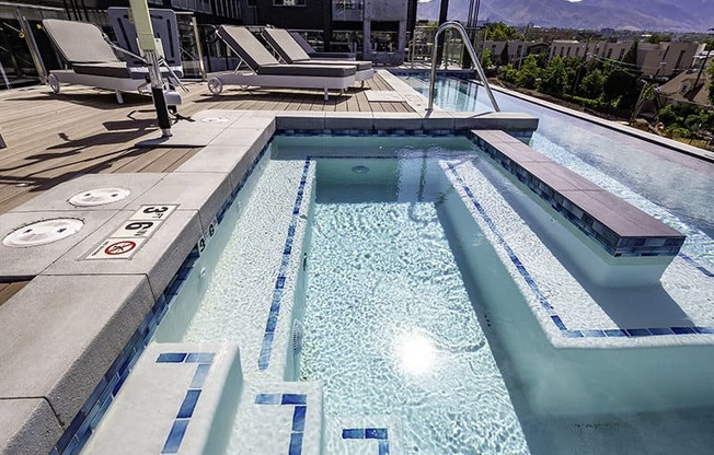 steps into an infinity pool at Lotus Republic Apartments for rent in Downtown Salt Lake City, Utah