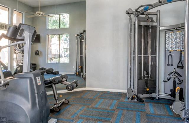 Ingleside Apartments Fitness Center with cardio and weight machines