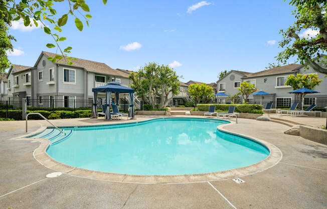 the preserve at ballantyne commons pool with apartment buildings