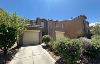 Southwest single family home with split garages