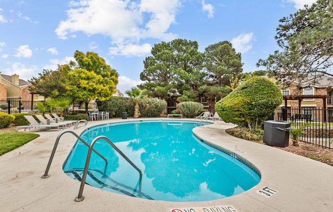 the sparkling swimming pool at our apartments