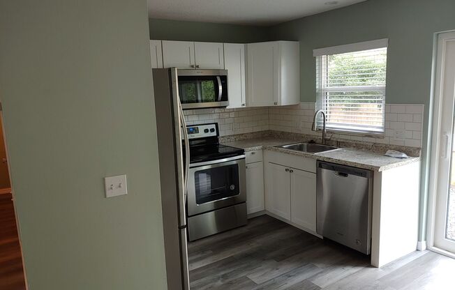 Come enjoy living in this recently renovated 3/3 near downtown