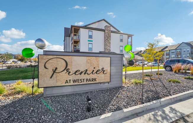the preserve at west park sign in front of an apartment building