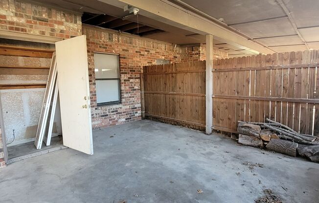 3 Bedroom and 2 Bath Duplex with Carport and Fenced Back Yard