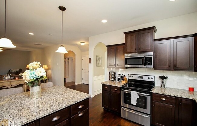 Wow, prime prime Newnan location, approx 1 mile to EVERYTHING! Hardwoods, Stainless, coffered ceilings, must see!