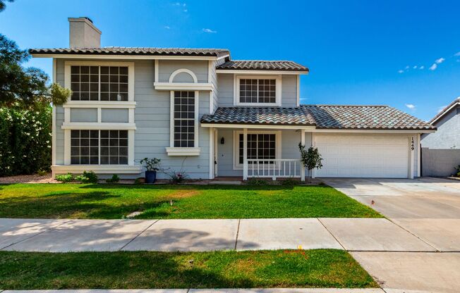 Inviting 4-Bedroom Home with Included Landscaping Services in Chandler