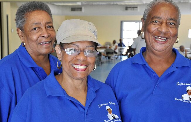 Women smiling inside community room_Lafitte,New Orleans, LA
