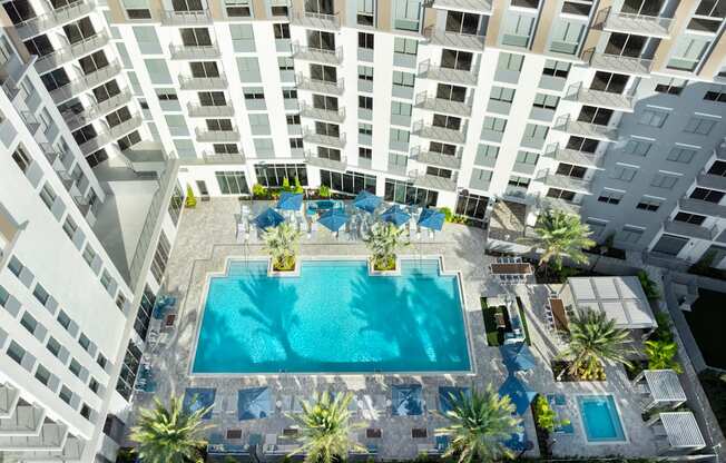 Resort-Inspired Pool Deck at The Marc Luxury Apartments in Palm Beach Gardens FL