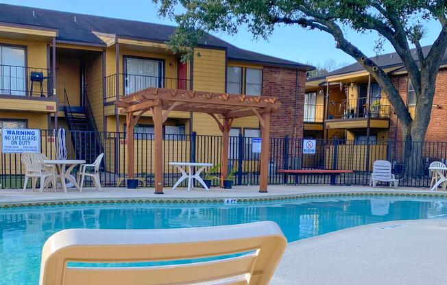 a chair sitting in front of a pool