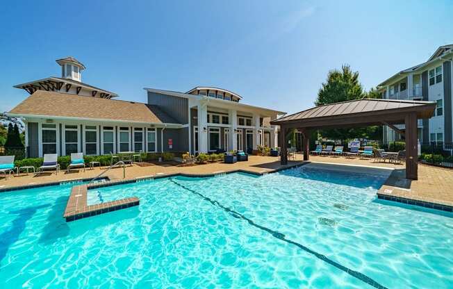 the preserve at ballantyne commons pool with apartment buildings in the background