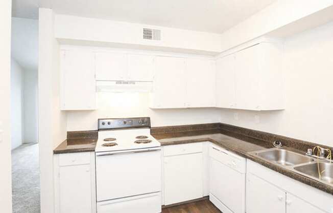 Wood floor kitchen at Canyon Creek Apartments, Missouri, 64132