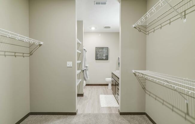 Walk in closet in master bedroom at WH Flats new luxury apartments in south Lincoln NE 68516