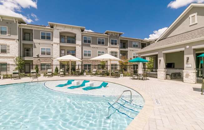 Pool at Cue Luxury Apartments, Cypress, TX