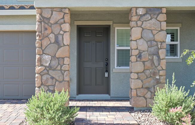 Mountains Edge!! Gated!!  4 bedrooms!! Primary Bedroom and bath down Stairs!! 2 Primary bedrooms!! Built 2021!!