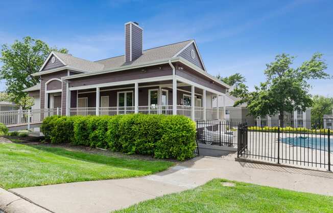 a house with a pool in front of it at Eastwood Crossings, Missouri