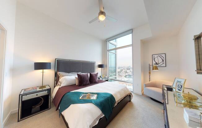 Expansive bedroom with plush wall-to-wall carpeting